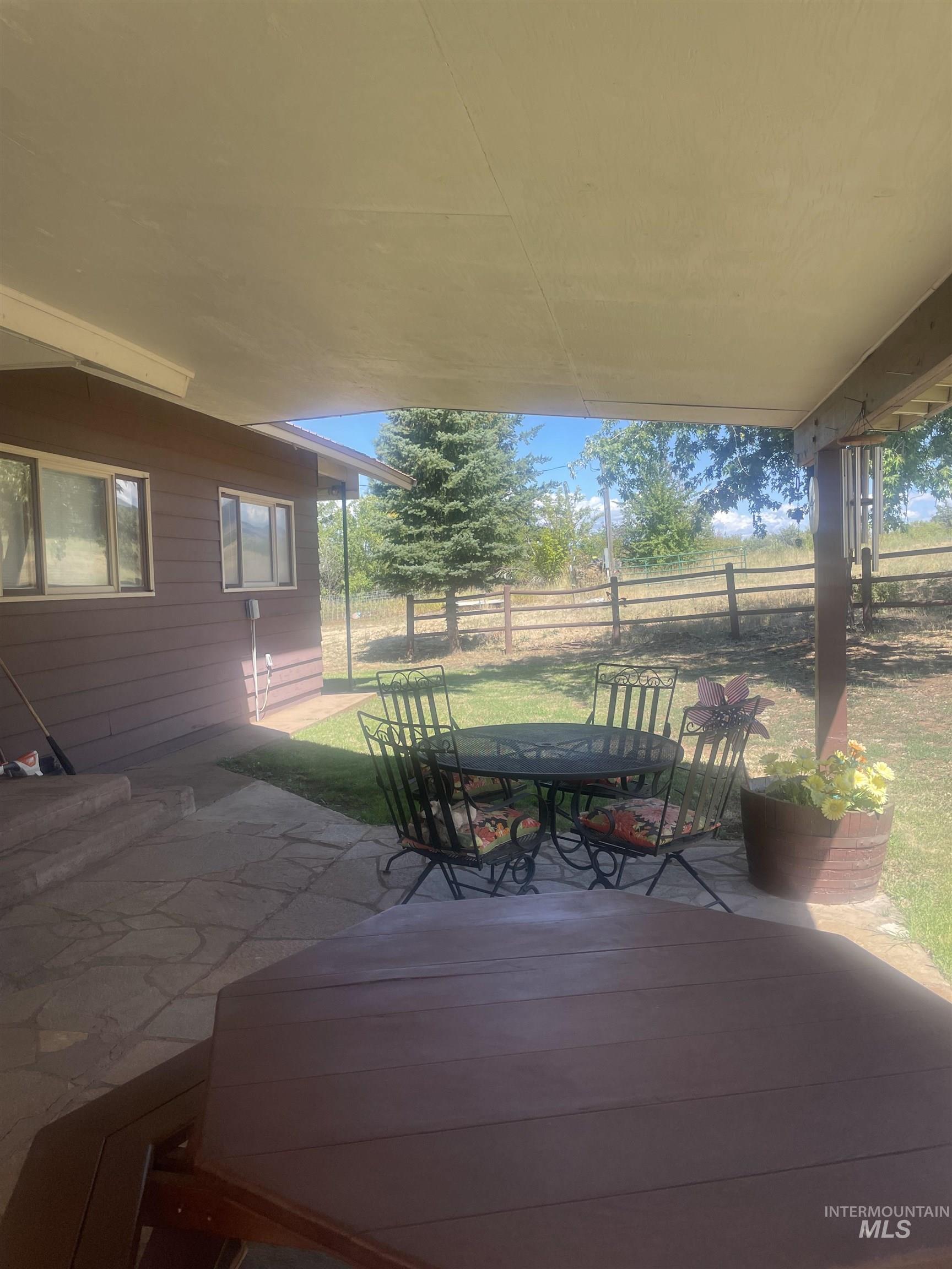 2002 Missman Road Council, ID 83612 - Photo 37 of 38 View of patio featuring outdoor dining area