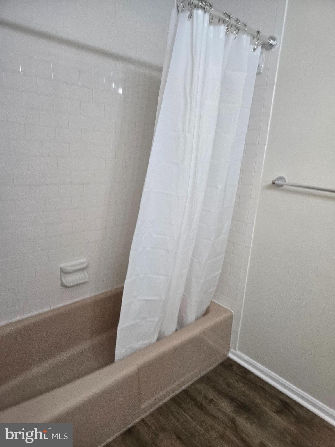 341 South 26th Street, Unit A Purcellville, VA 20132 - Photo 22 of 33 a bathroom with a bathtub and shower