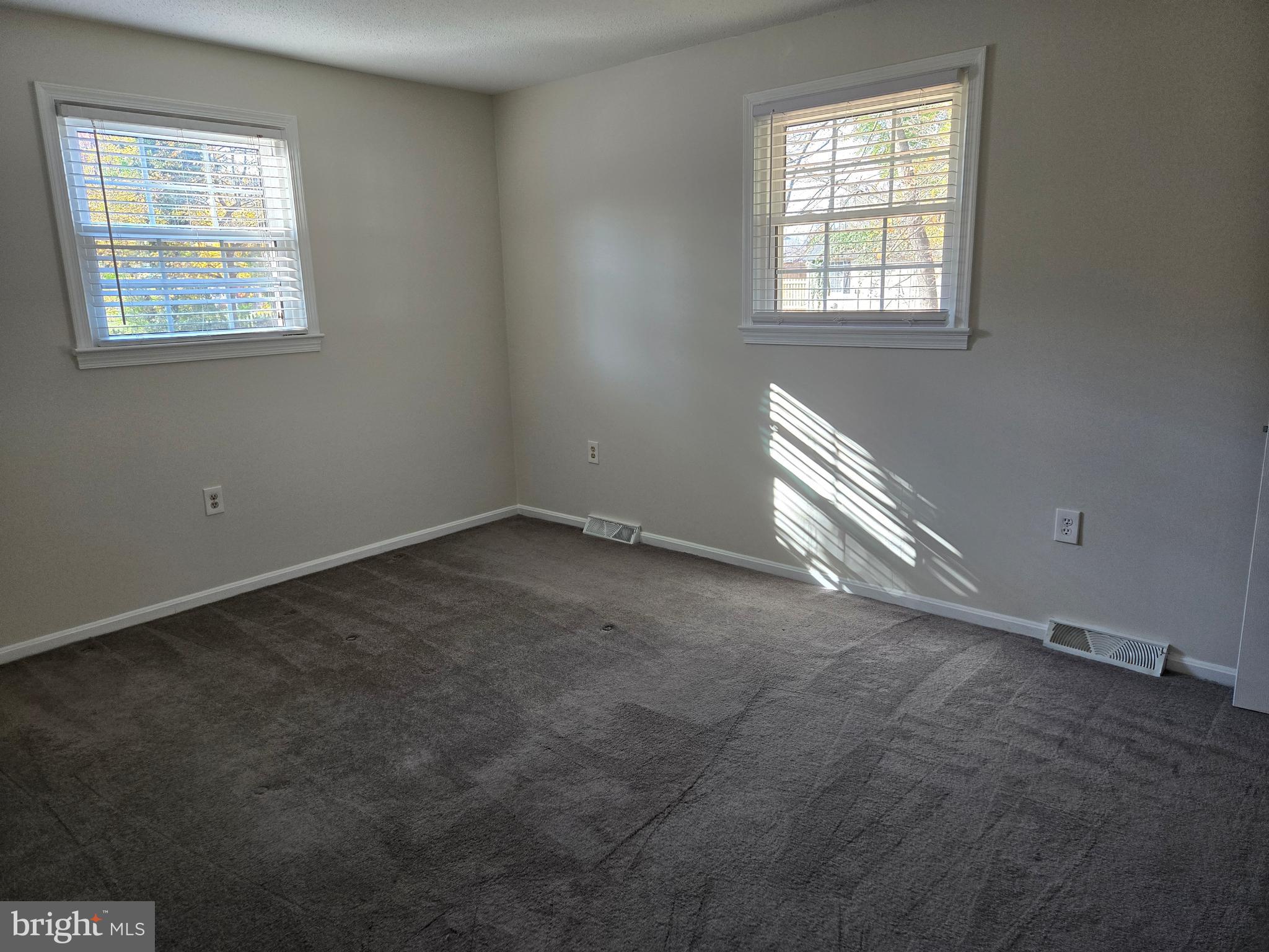 341 South 26th Street, Unit A Purcellville, VA 20132 - Photo 25 of 33 an empty room with windows