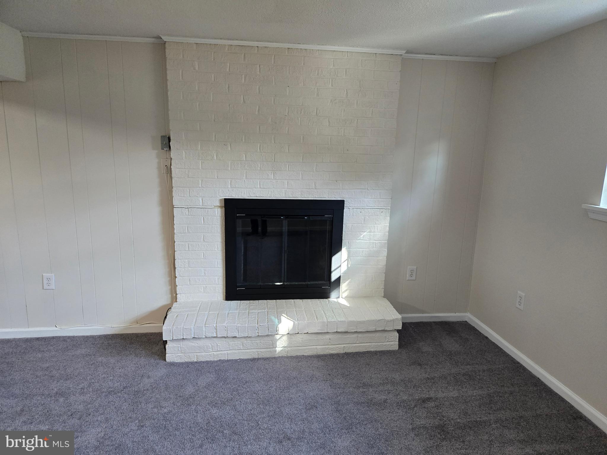 341 South 26th Street, Unit A Purcellville, VA 20132 - Photo 31 of 33 a room with a fireplace