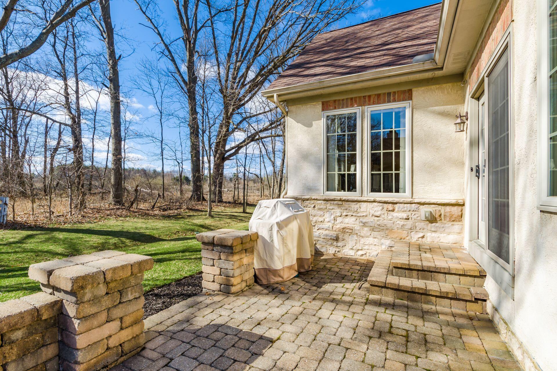 5410 Slater Ridge Westerville, OH 43082 - Photo 4 of 78 Enjoy the tree-lined view from the paver patio.