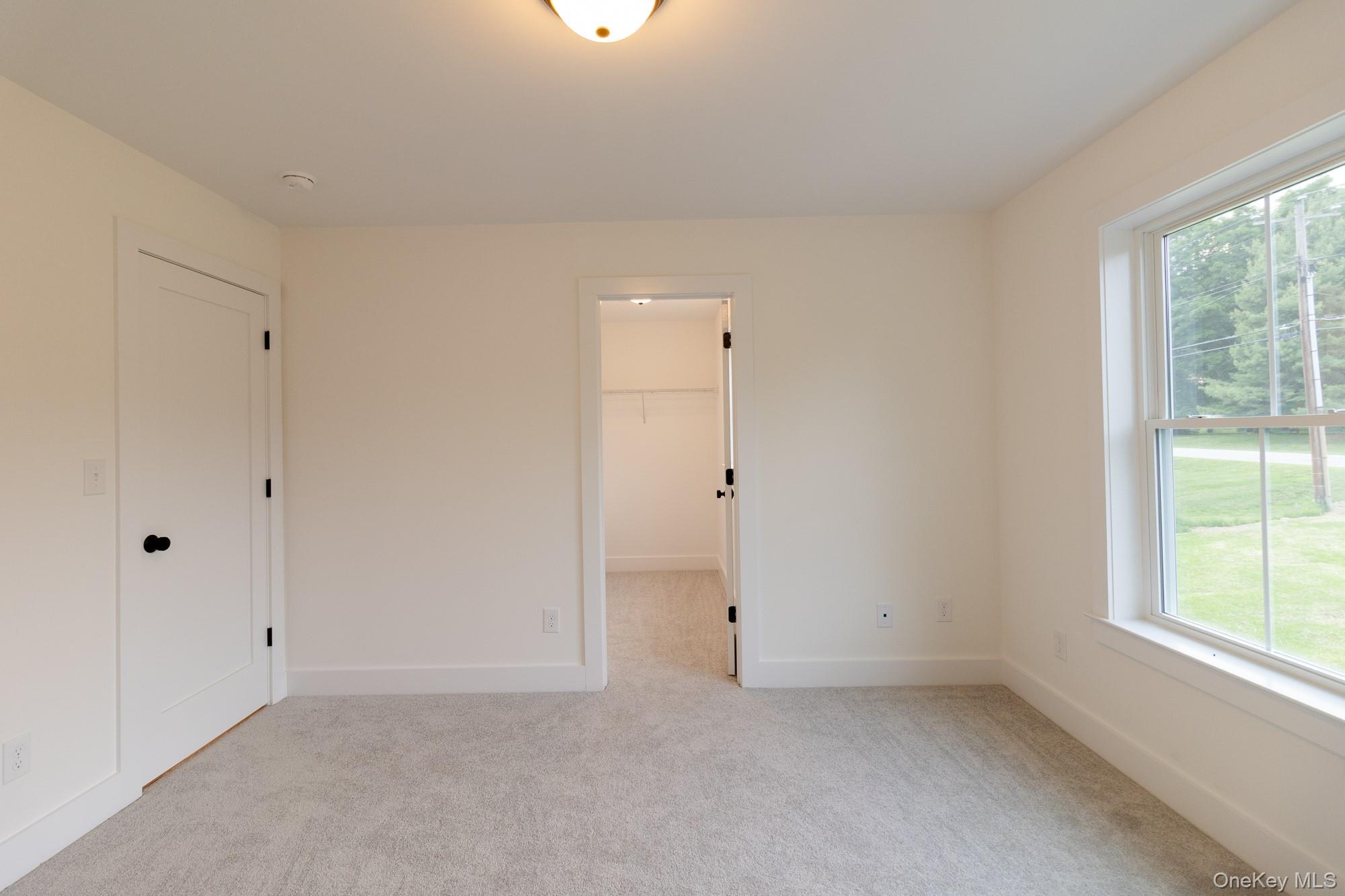 750 Ridgebury Road Slate Hill, NY 10973 - Photo 31 of 41 a view of an empty room with a window