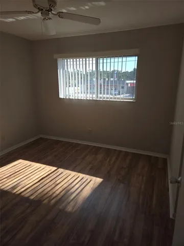 a view of a room that has a window in it