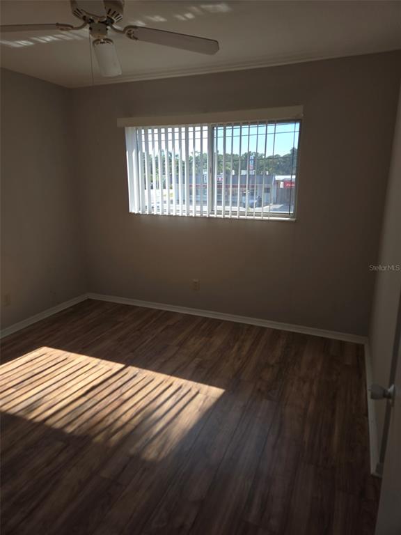 3101 Bee Ridge Road, Unit 204 Sarasota, FL 34239 - Photo 6 of 7 a view of a room that has a window in it
