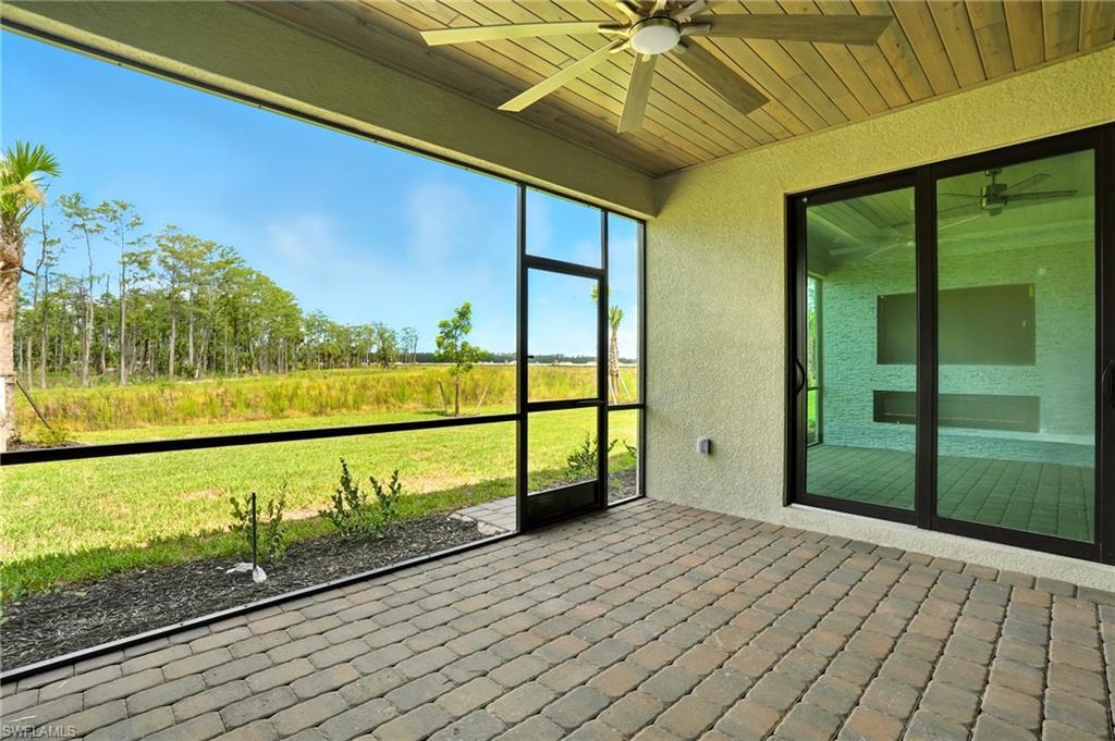 20489 Verawood Loop Estero, FL 33928 - Photo 35 of 50 Unfurnished sunroom with a ceiling fan