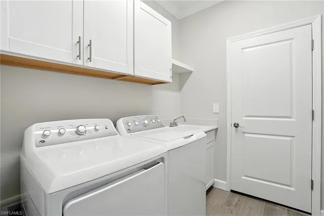 a front view of house with a garden