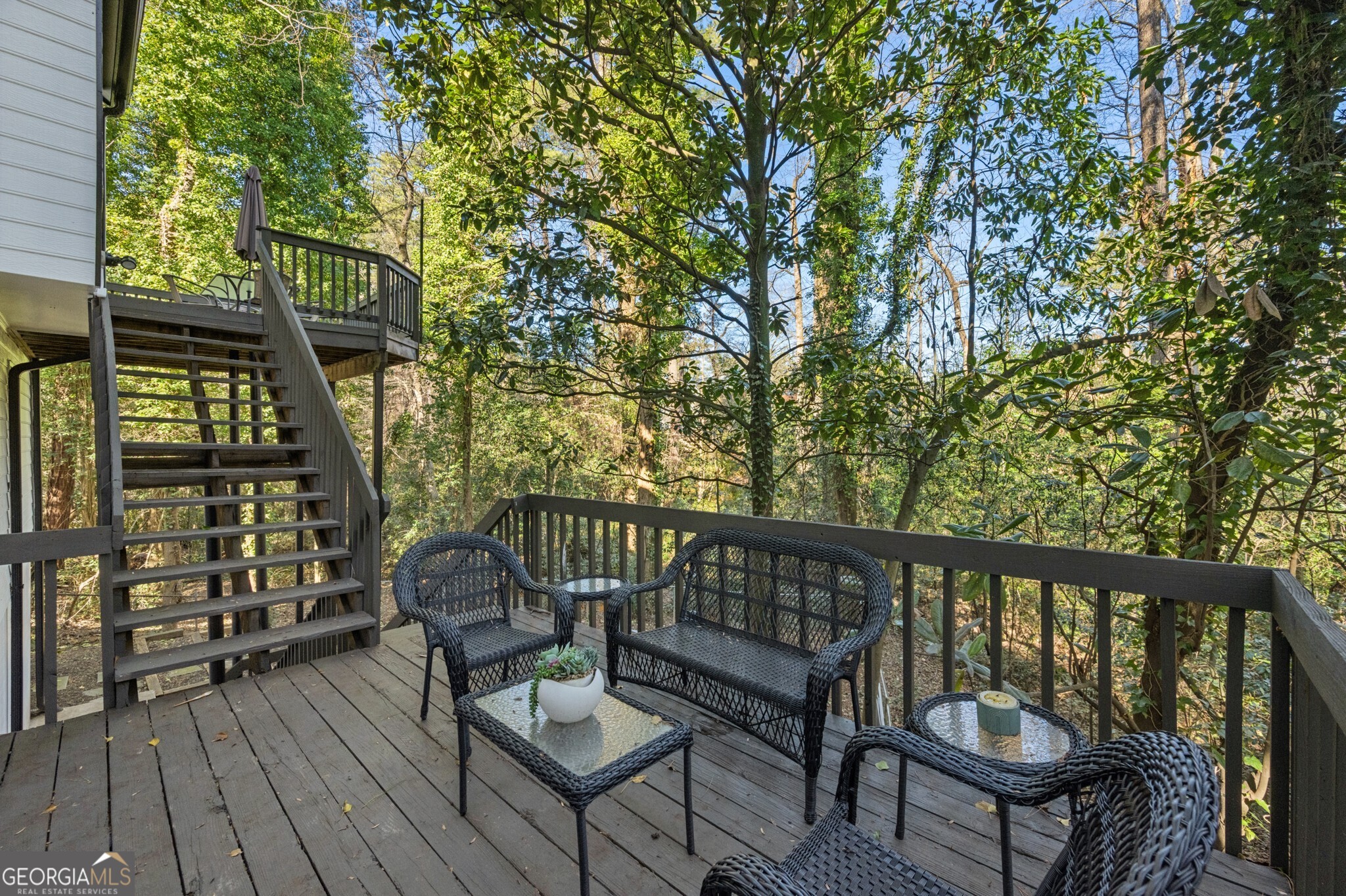 1810 Fairoaks Road Decatur, GA 30033 - Photo 7 of 52 Multi-Level Deck Overlooking A Fully Fenced Backyard With A Firepit