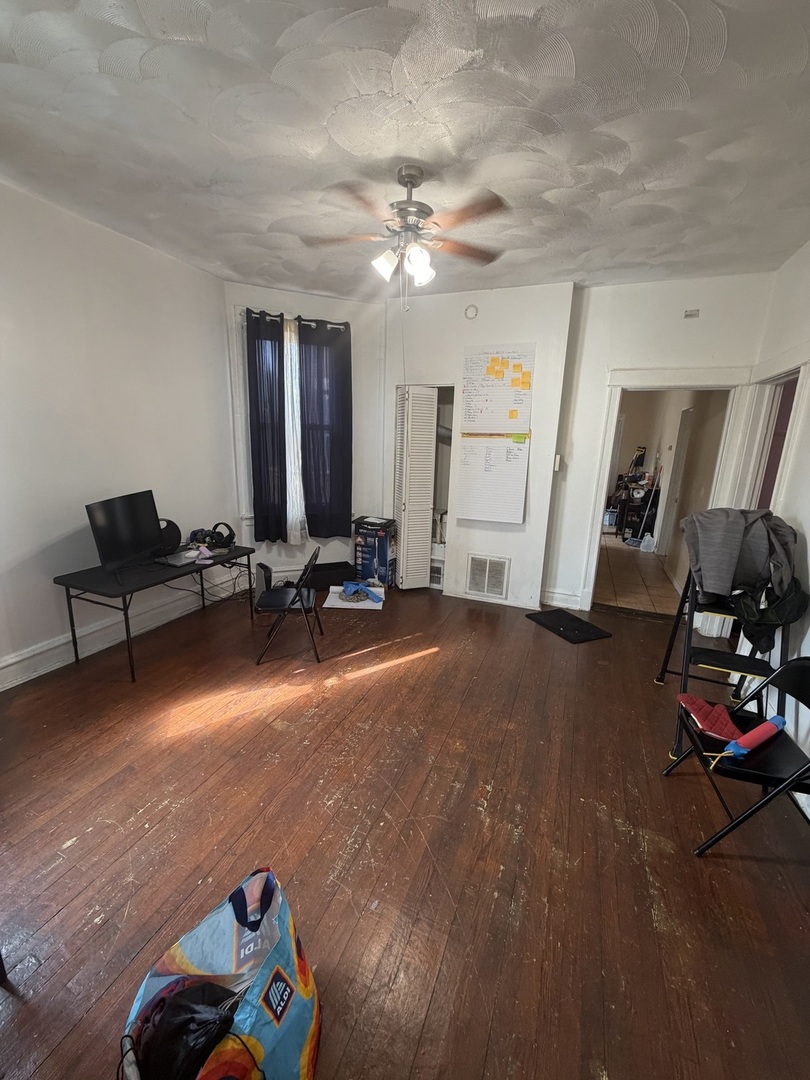 7316 South Lowe Avenue Chicago, IL 60621 - Photo 15 of 16 a view of a room with gym equipment