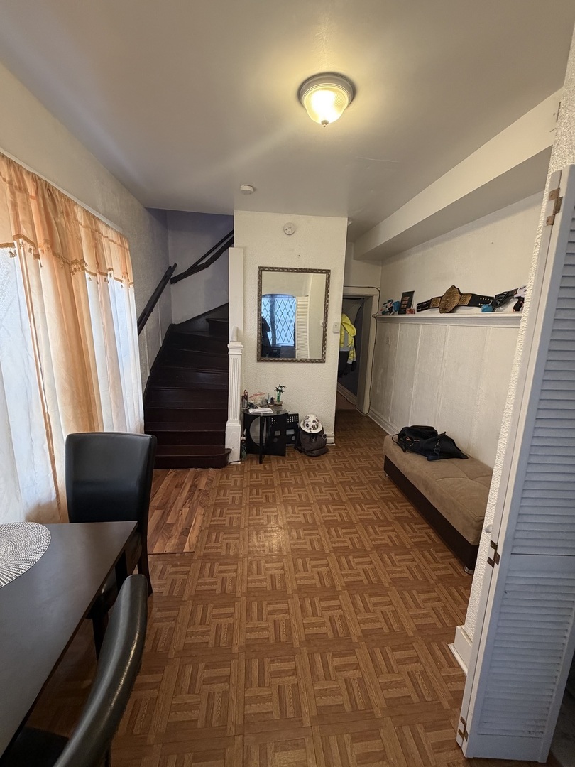 7316 South Lowe Avenue Chicago, IL 60621 - Photo 3 of 16 a living room with furniture and a window