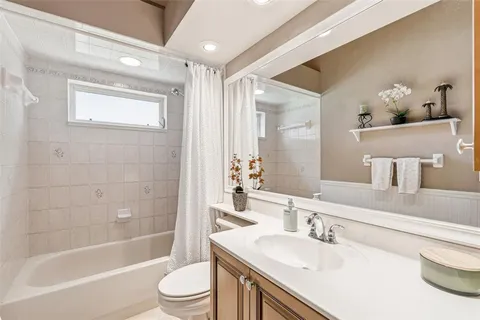 a workspace with furniture and a chandelier