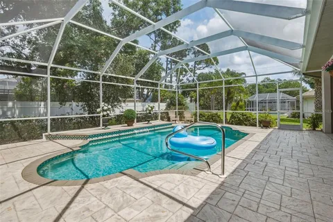 a bathroom with a toilet a sink a vanity and mirror