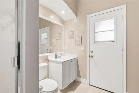 an aerial view of a house with a garden