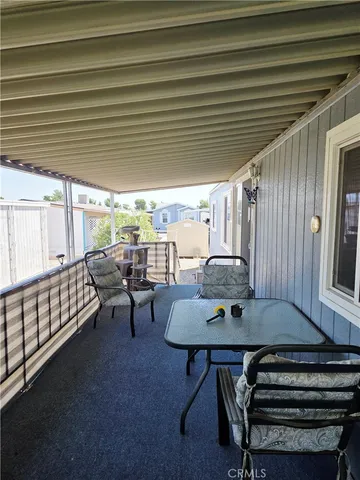 a workspace with furniture and window