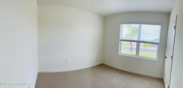 an empty room with a window