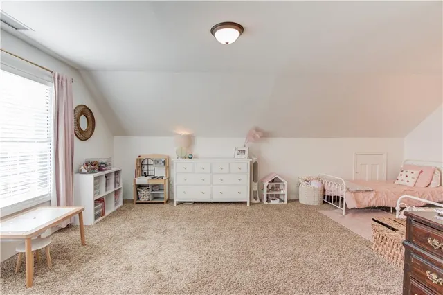 a view of livingroom with furniture and window