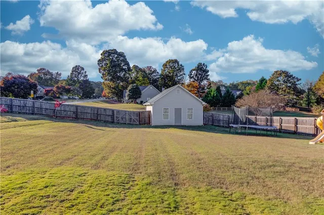 a view of a swimming pool with an ocean view