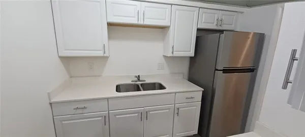 a view of a utility room with empty racks