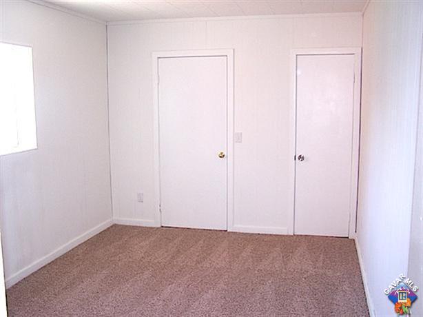 1241 Kings Road Palmdale, CA 93551 - Photo 11 of 21 an empty room with closet