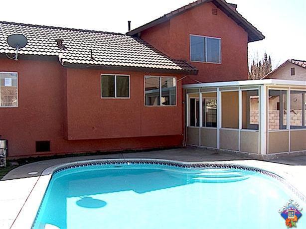 1241 Kings Road Palmdale, CA 93551 - Photo 18 of 21 a front view of a house