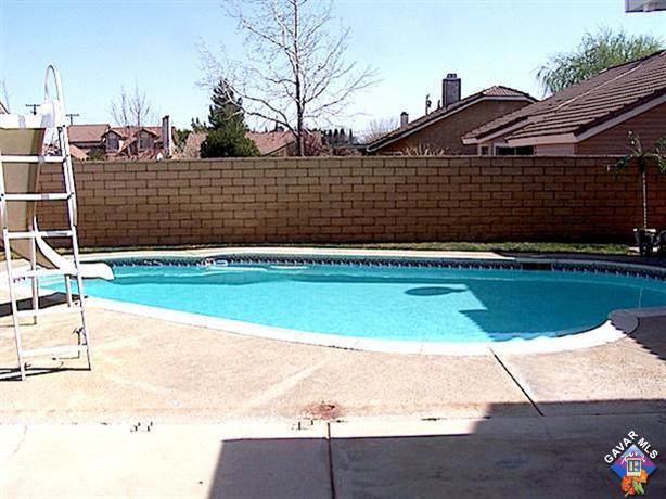 1241 Kings Road Palmdale, CA 93551 - Photo 19 of 21 a view of outdoor space and swimming pool