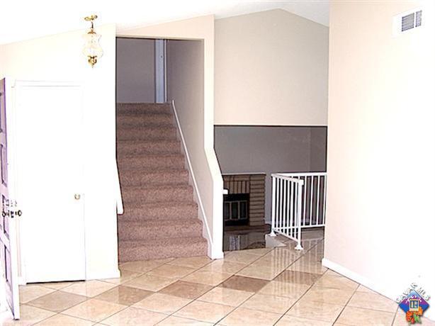 1241 Kings Road Palmdale, CA 93551 - Photo 2 of 21 a view of entryway and hall