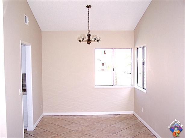 1241 Kings Road Palmdale, CA 93551 - Photo 5 of 21 a view of a room with an empty space