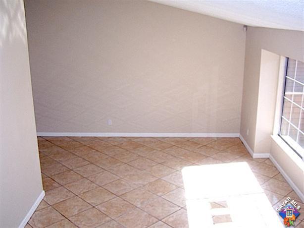 1241 Kings Road Palmdale, CA 93551 - Photo 10 of 21 a view of an empty room and window
