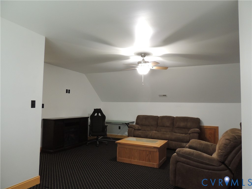 12512 Cox Road Church Road, VA 23833 - Photo 36 of 42 Featuring electric fireplace sofa and chair that r