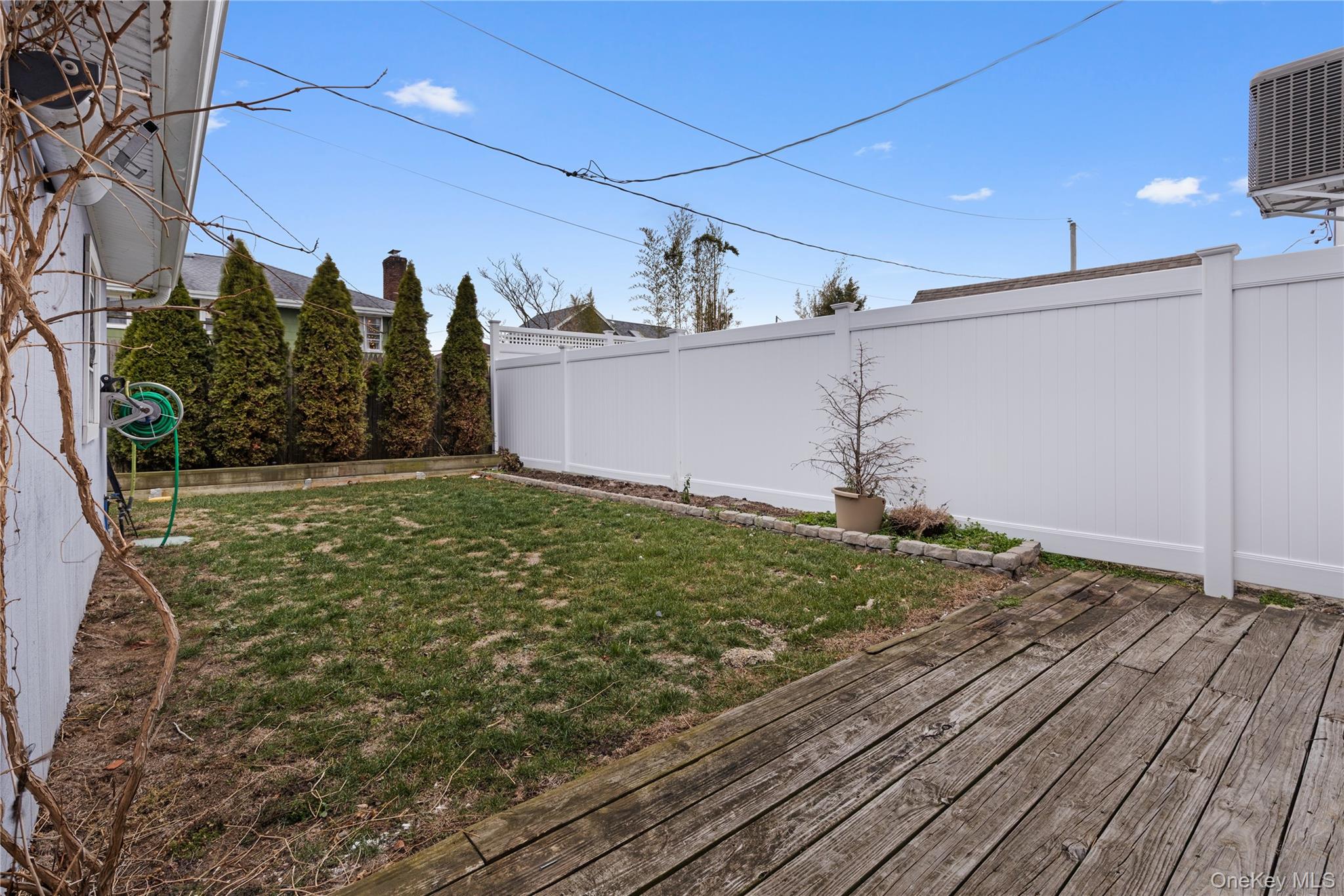 33 Kent Road Island Park, NY 11558 - Photo 17 of 26 a view of a backyard