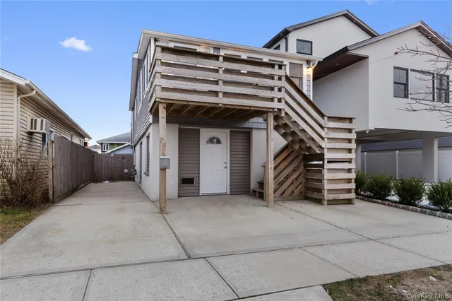 a front view of a house with a garage