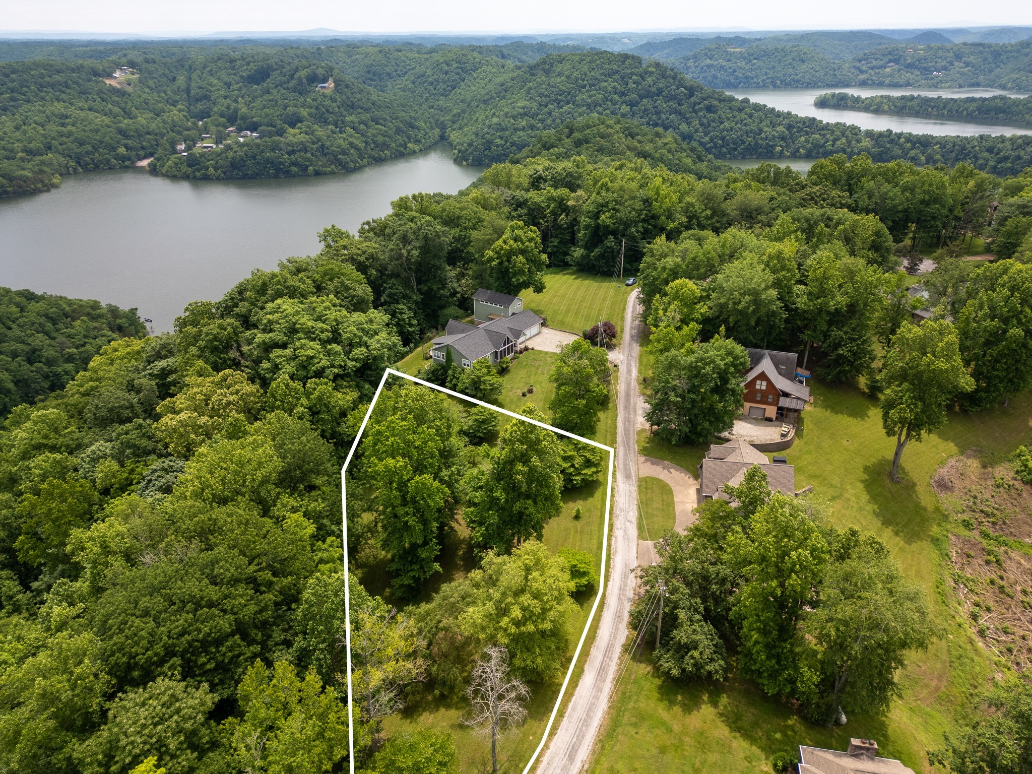 0 Lafever Ridge Road Silver Point, TN 38582 - Photo 7 of 13 an aerial view of lake residential house with outdoor space and trees around