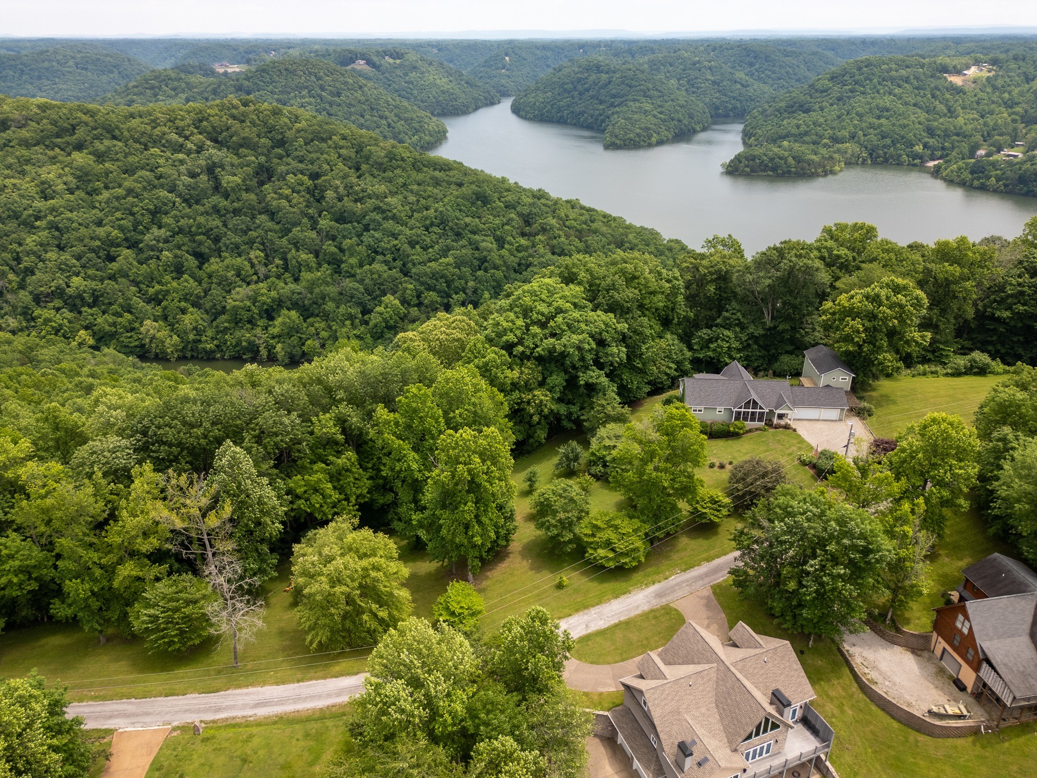 0 Lafever Ridge Road Silver Point, TN 38582 - Photo 9 of 13 an aerial view of residential house with outdoor space and river