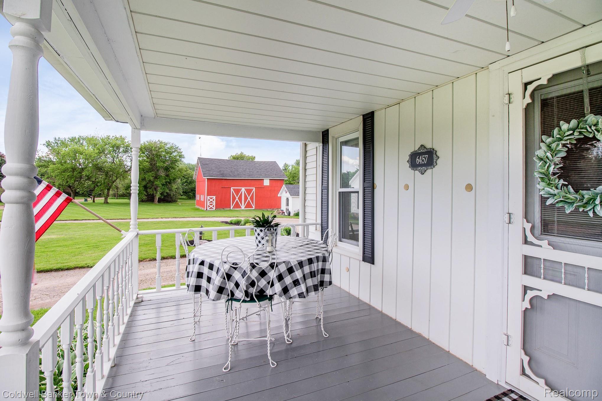 6457 Layton Road Fowlerville, MI 48836 - Photo 19 of 36 Front Porch