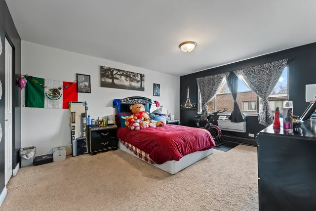 a bed room with a bed and a couch