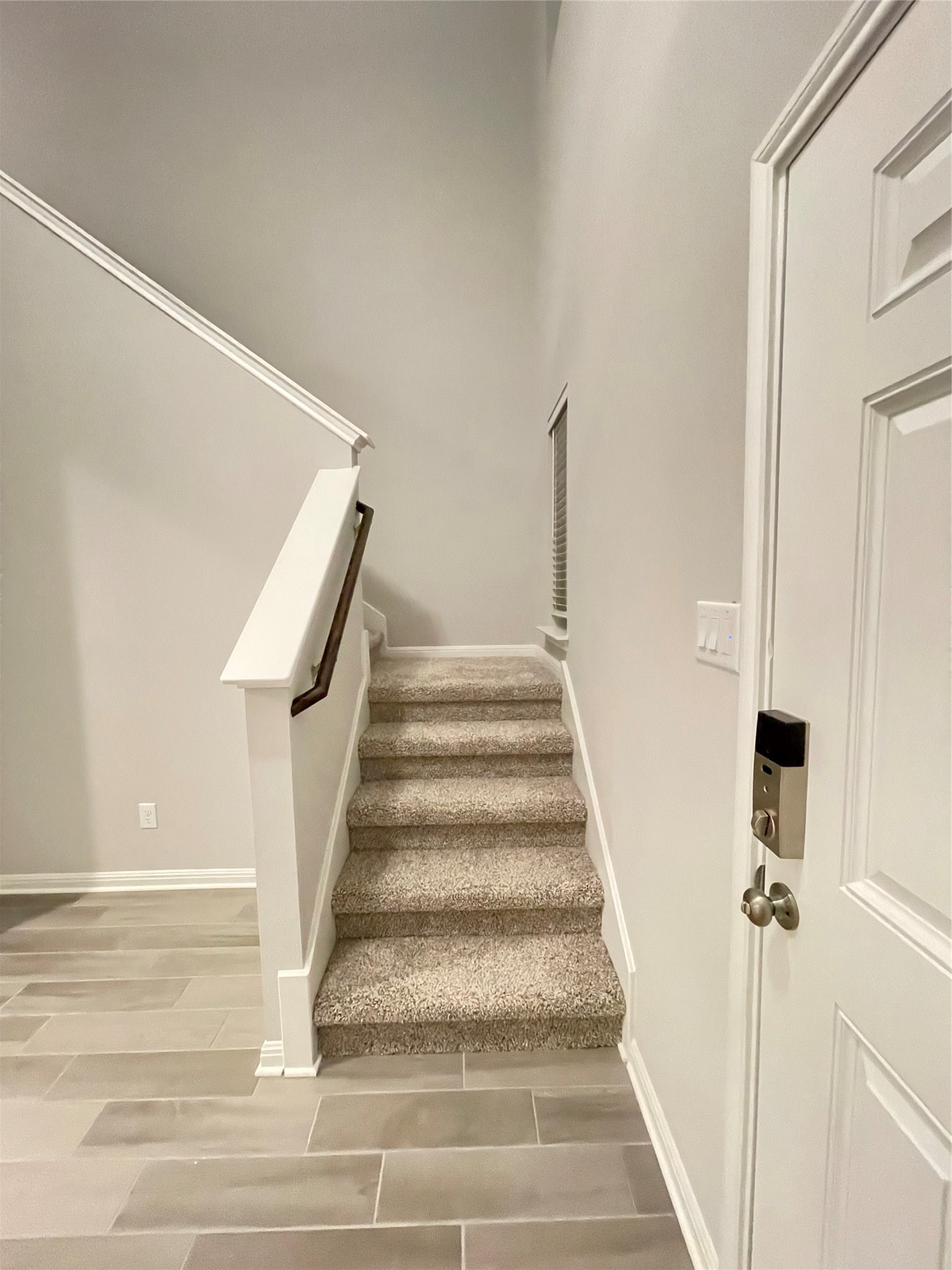 316 Mclintock Road Jarrell, TX 76537 - Photo 16 of 40 a view of staircase with white walls