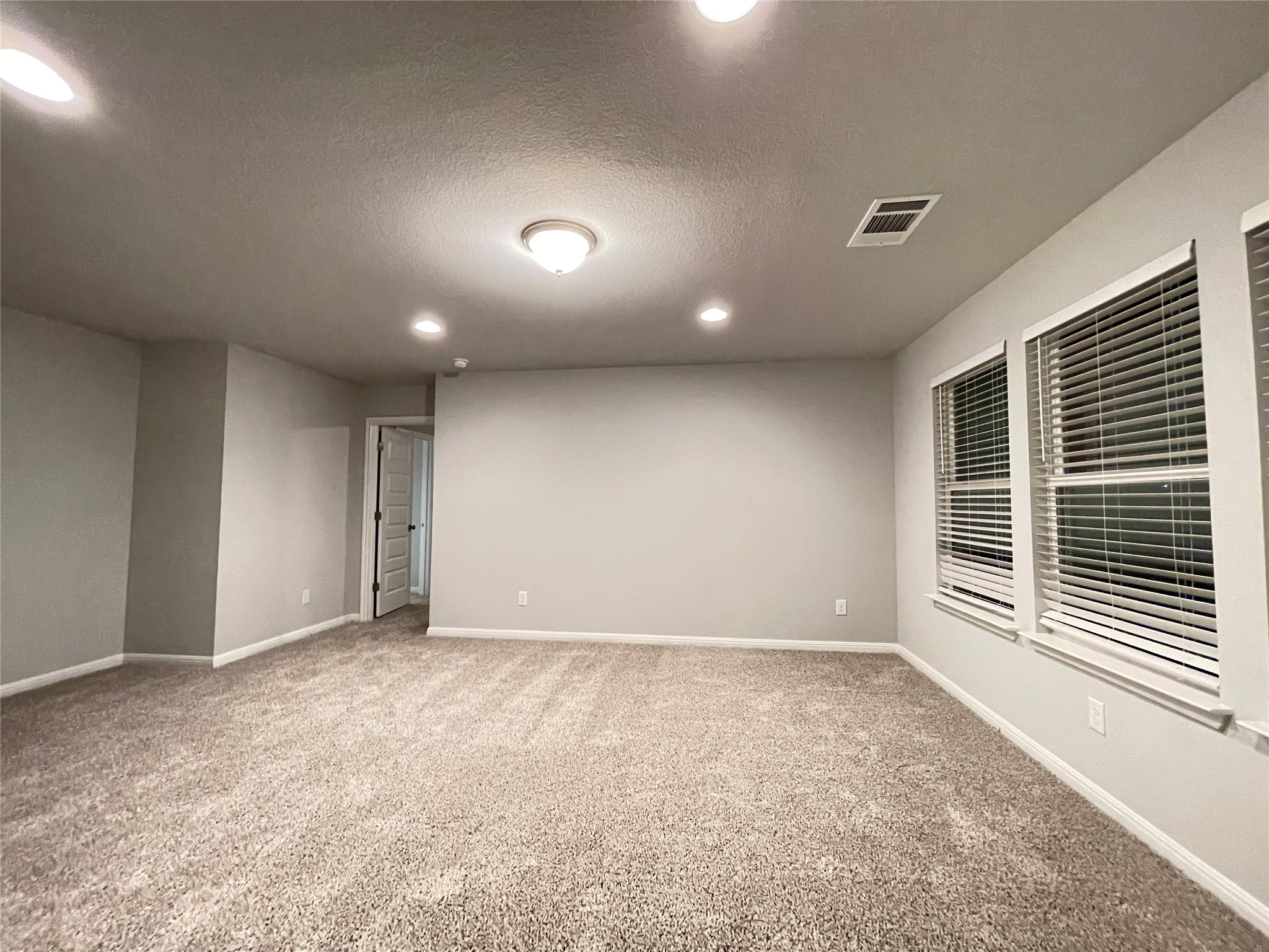 316 Mclintock Road Jarrell, TX 76537 - Photo 18 of 40 a view of an empty room with a window