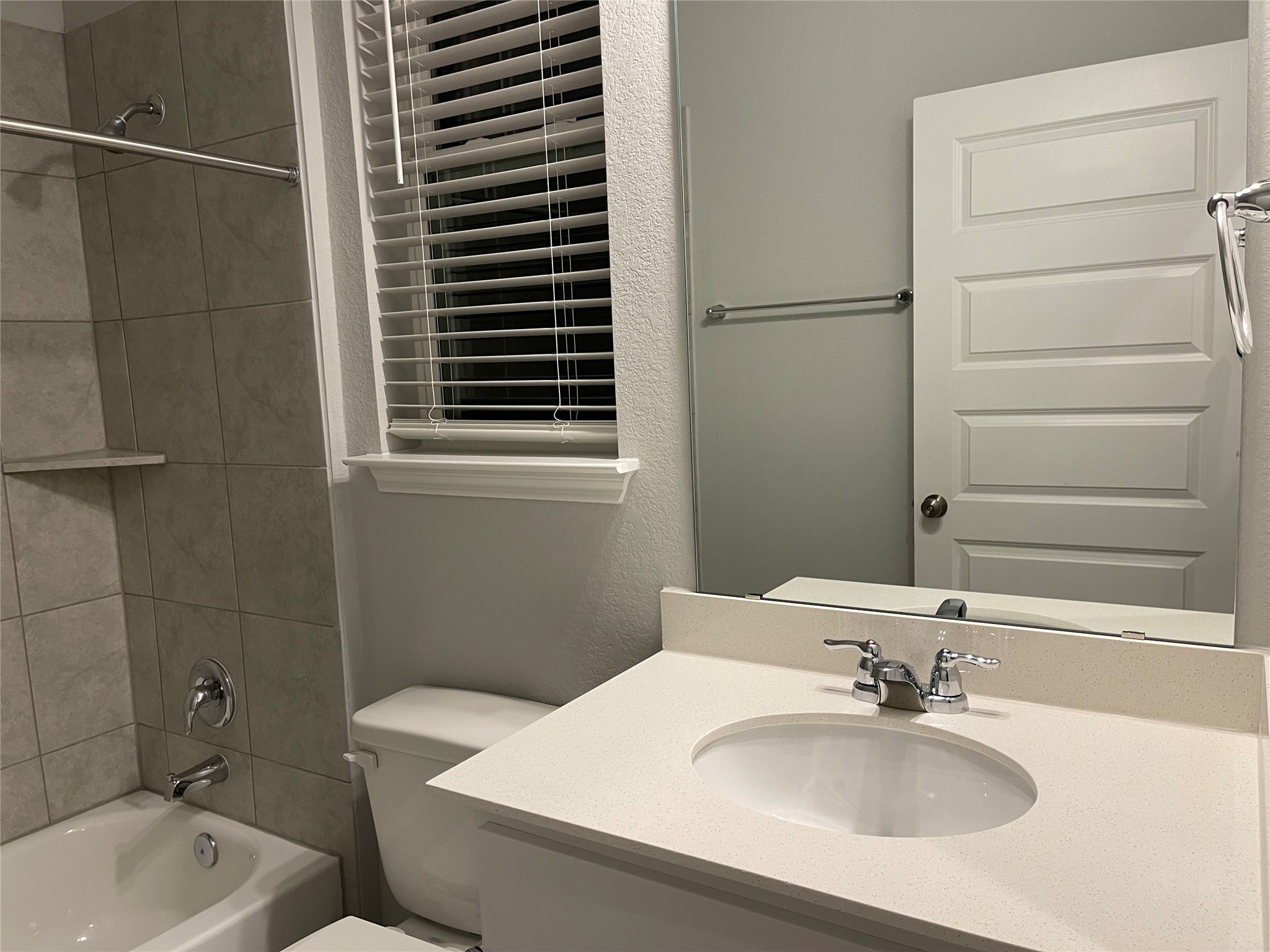 316 Mclintock Road Jarrell, TX 76537 - Photo 3 of 40 a bathroom with a sink toilet and shower