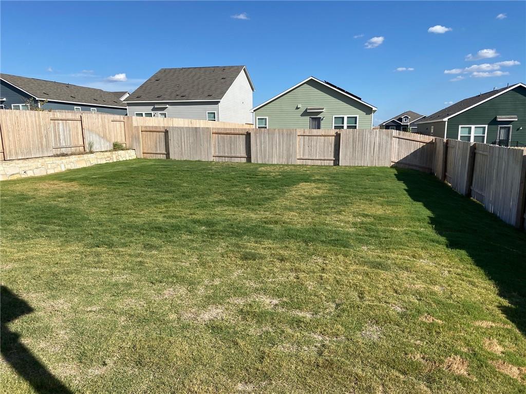 316 Mclintock Road Jarrell, TX 76537 - Photo 35 of 40 a view of a yard in front of house