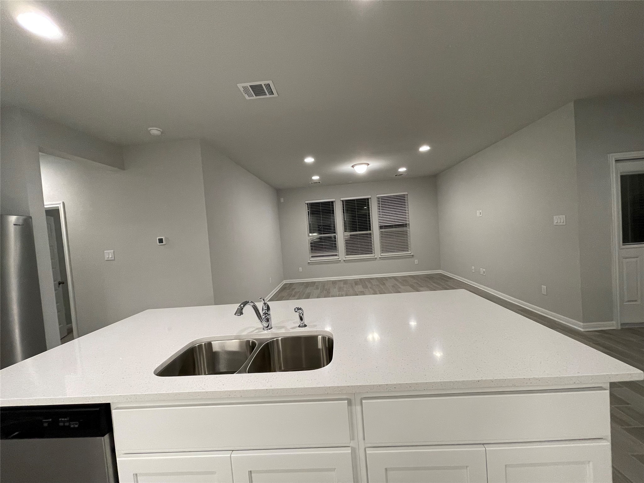 316 Mclintock Road Jarrell, TX 76537 - Photo 8 of 40 a kitchen with a sink and chandelier