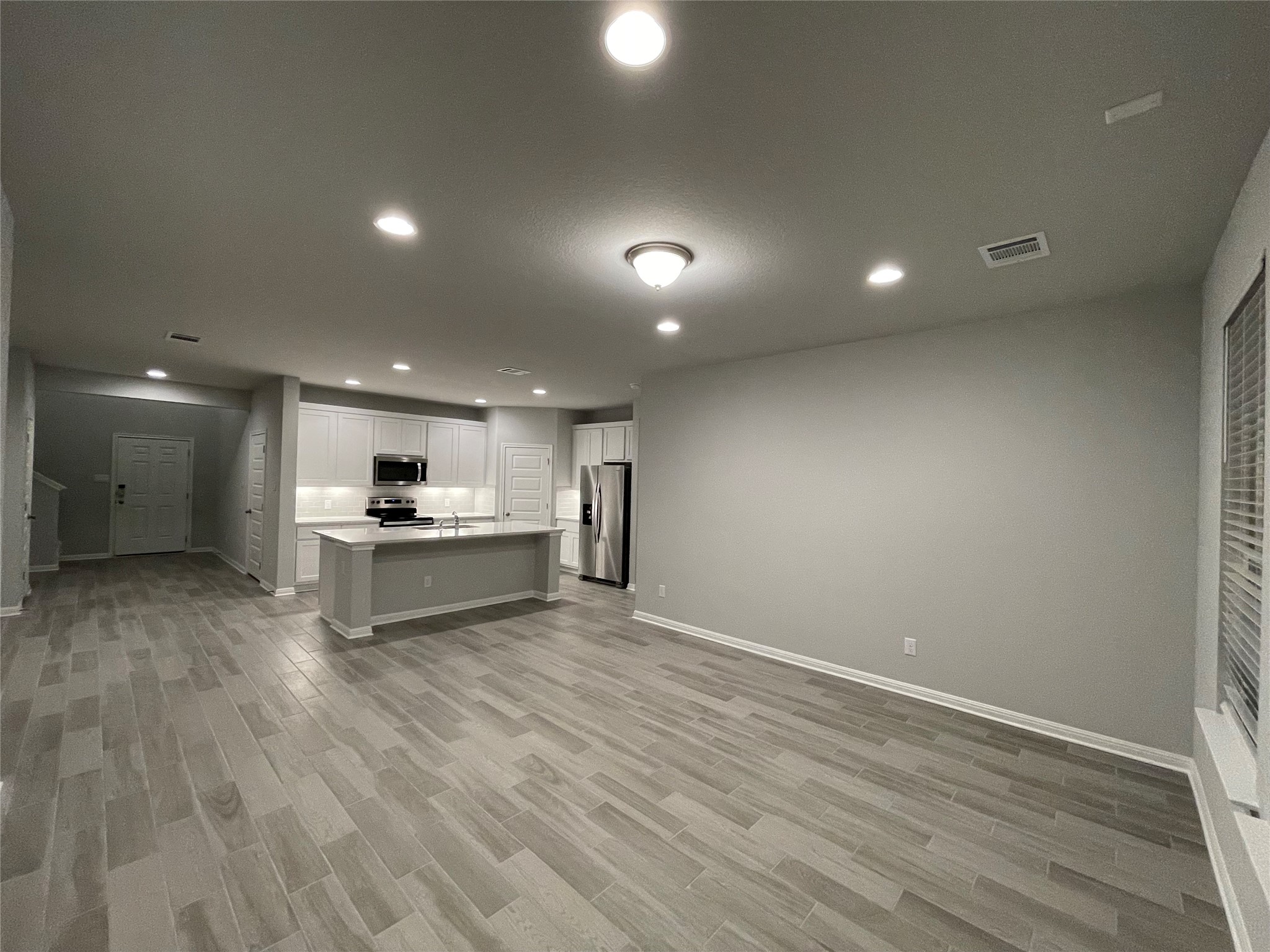 316 Mclintock Road Jarrell, TX 76537 - Photo 9 of 40 a view of kitchen with wooden floor
