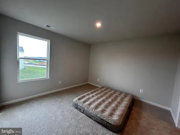 a view of a bedroom