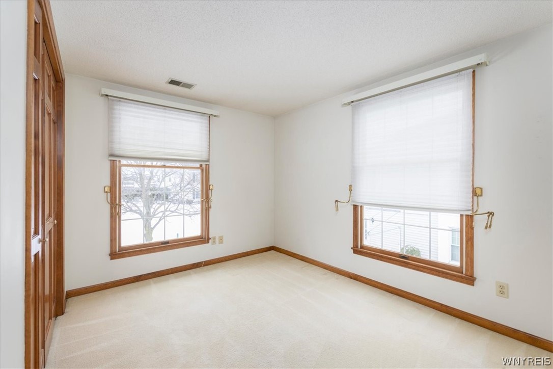 610 Youngs Road, Unit H Amherst, NY 14221 - Photo 14 of 19 Second Bedroom