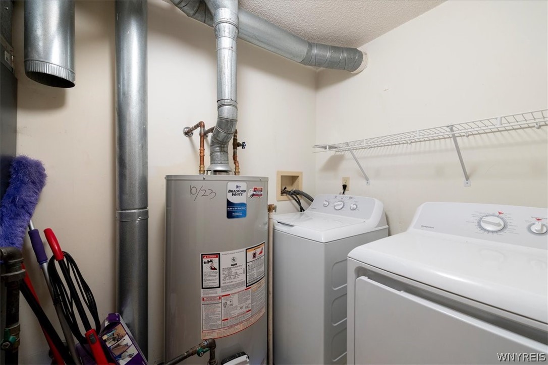 610 Youngs Road, Unit H Amherst, NY 14221 - Photo 16 of 19 In unit laundry (washer and dryer stay) and room f