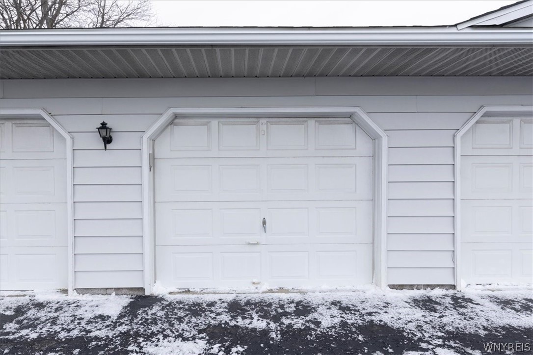 610 Youngs Road, Unit H Amherst, NY 14221 - Photo 18 of 19 Private Garage with opener.