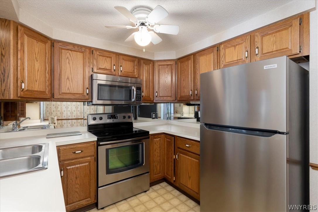 610 Youngs Road, Unit H Amherst, NY 14221 - Photo 8 of 19 Plenty of cabinet space for storage!