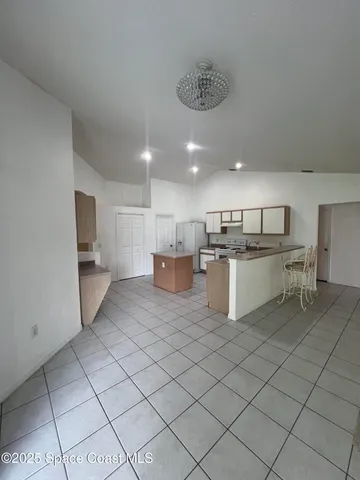 a view of an empty room with window