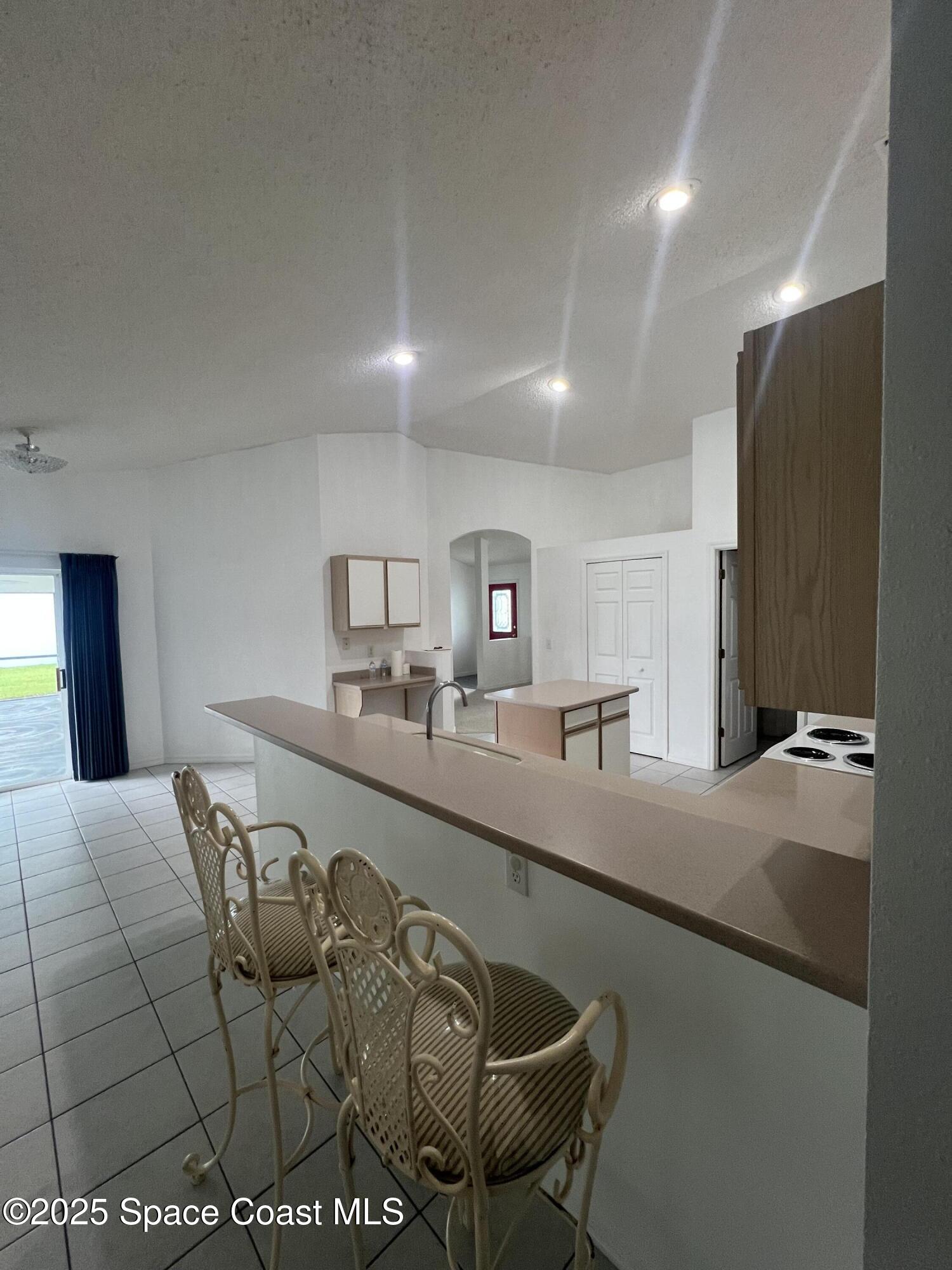 1213 Old Millpond Road Melbourne, FL 32940 - Photo 8 of 20 a living room with furniture