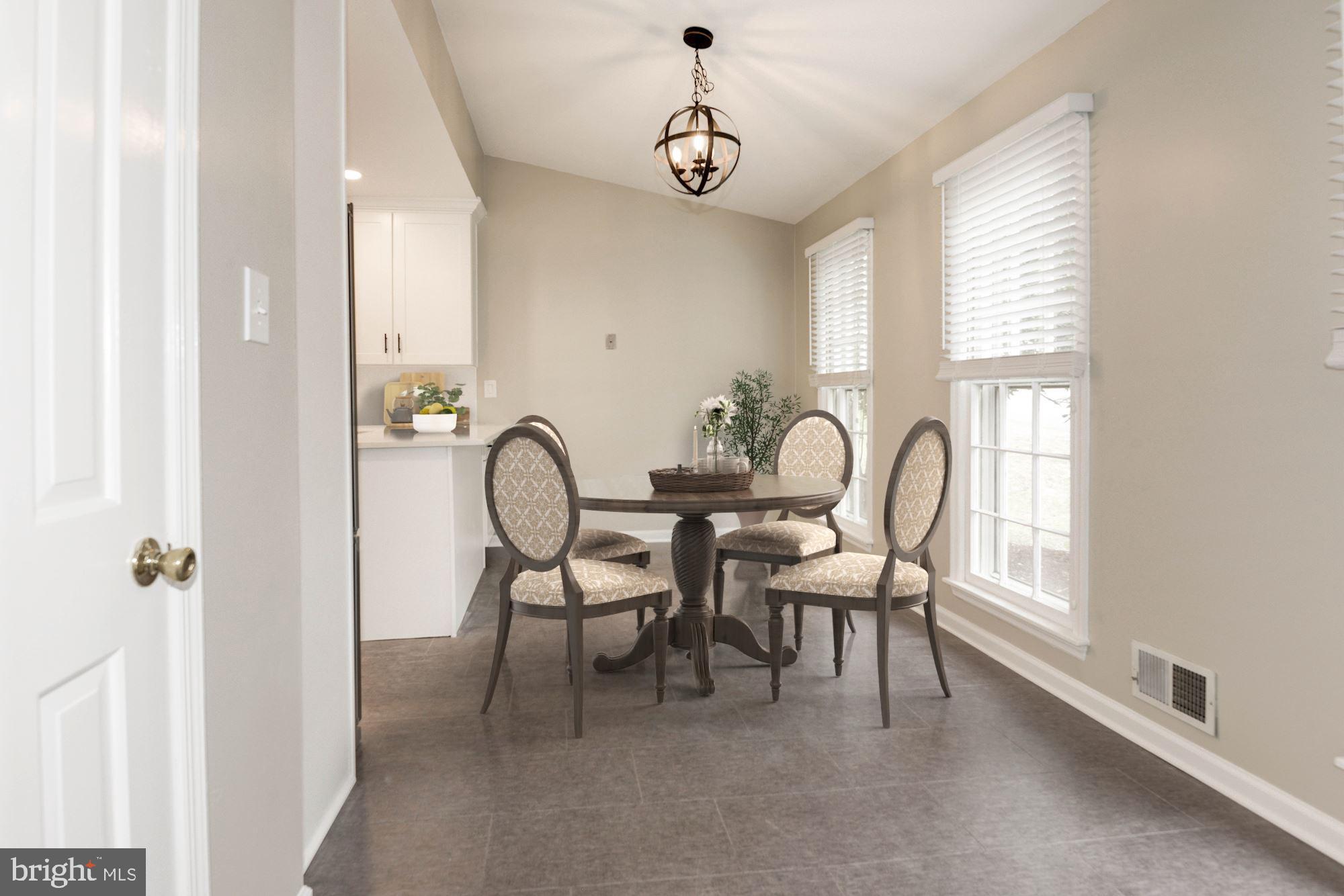 9348 Tovito Drive Fairfax, VA 22031 - Photo 7 of 31 Kitchen w large eating area - vaulted ceiling