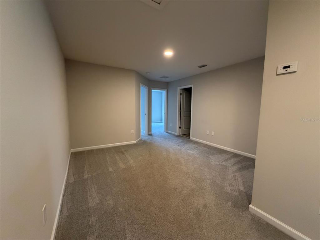 4632 Campsite Loop Orlando, FL 32824 - Photo 6 of 22 a view of an empty room