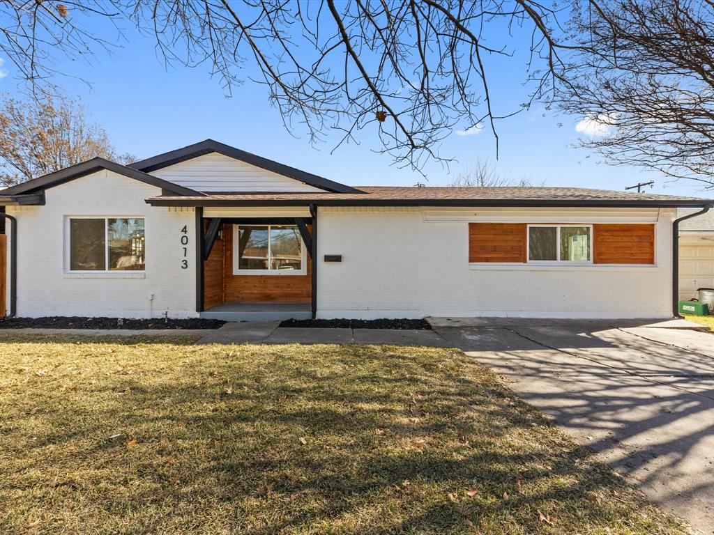 4013 Oleander Trail Mesquite, TX 75150 - Photo 1 of 28 Ranch-style house featuring brick siding and a front lawn